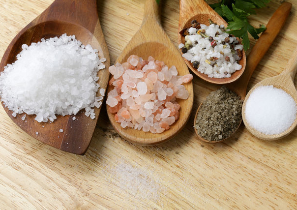 different types of salt (pink, sea, black, and with spices)